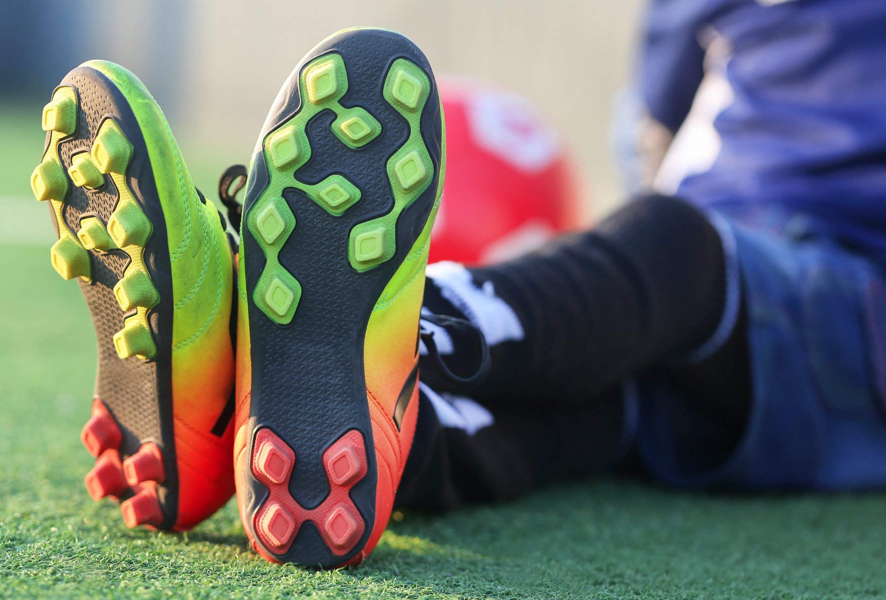 Child wearing football boots